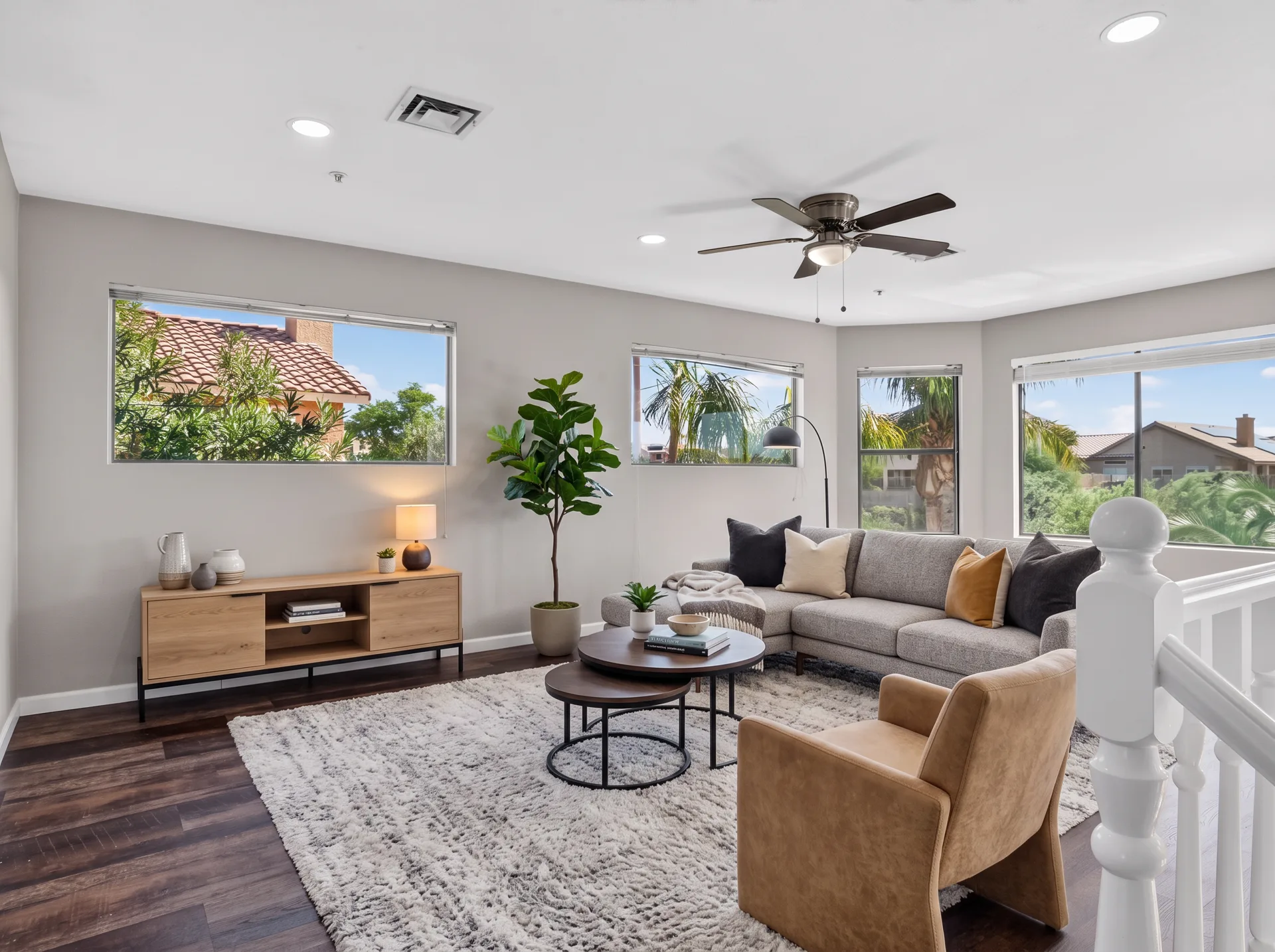 Empty living room vs virtually staged living room — after
