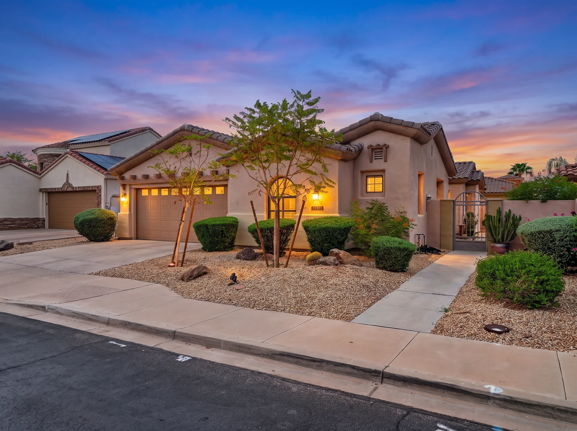 Suburban front elevation, daytime vs twilight — after